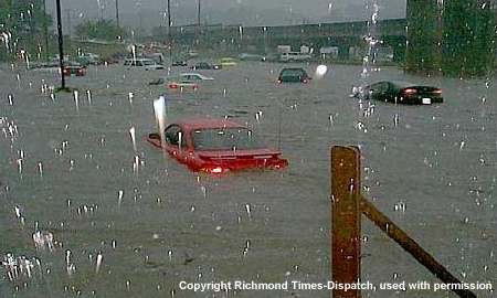 Cars stuck on a flooded highway.